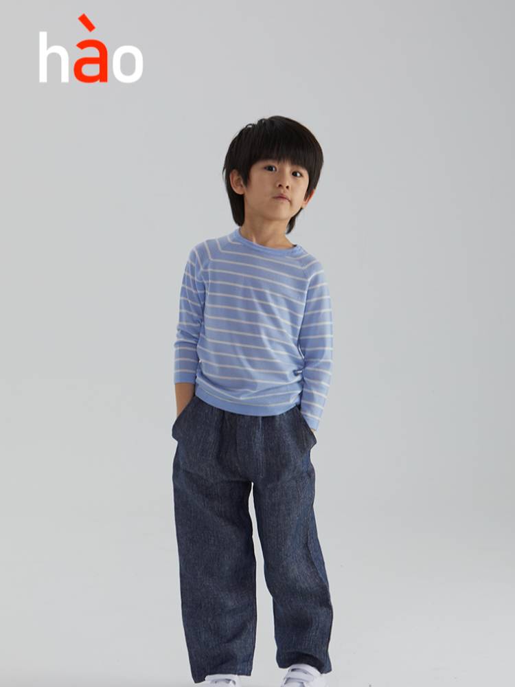 Baby striped pullover top made from 100% merino mercerized wool by ArborTree, showcasing soft, cozy knit with colorful stripes.