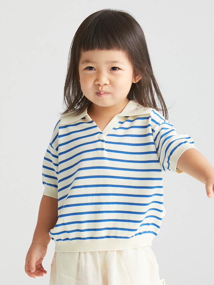 ArborTree superfine wool baby short-sleeved lapel T-shirt, soft and cozy children's top made from 100% superfine wool.
