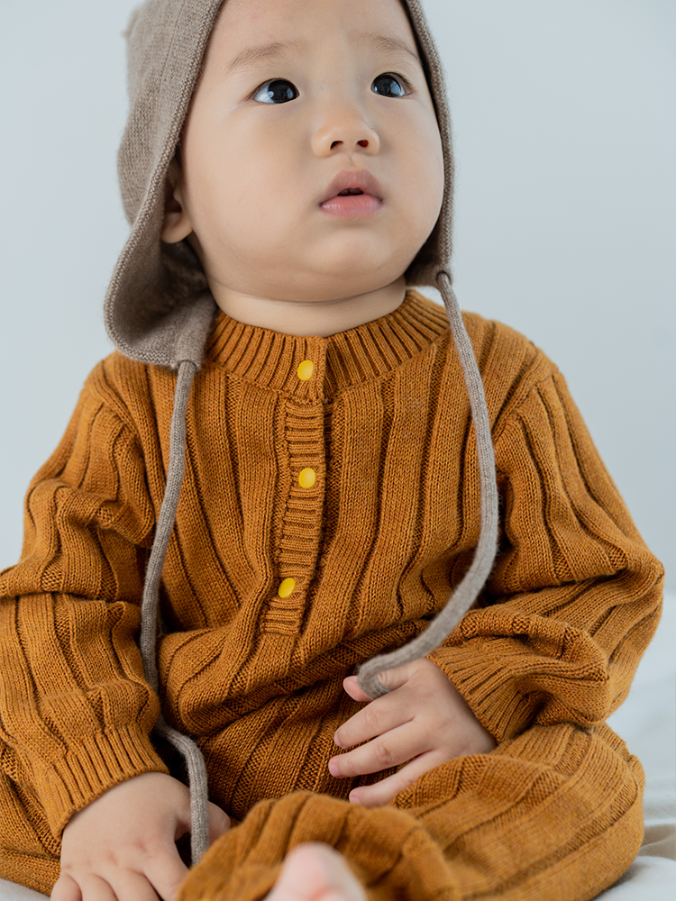 ArborTree organic cotton and cashmere front cut-back jumpsuit for kids, soft, breathable, and stylish natural children’s clothing.
