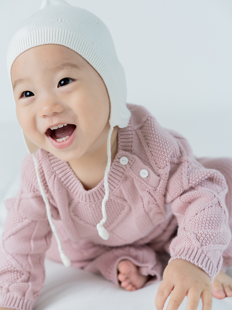 Organic cotton and cashmere shoulder open jumpsuit for kids by ArborTree, featuring a soft, comfortable design in natural fabric.