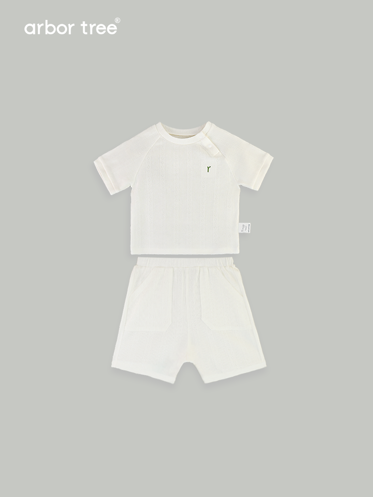 Organic cotton baby summer suit by ArborTree, soft breathable fabric with cute design for comfortable warm-weather wear.