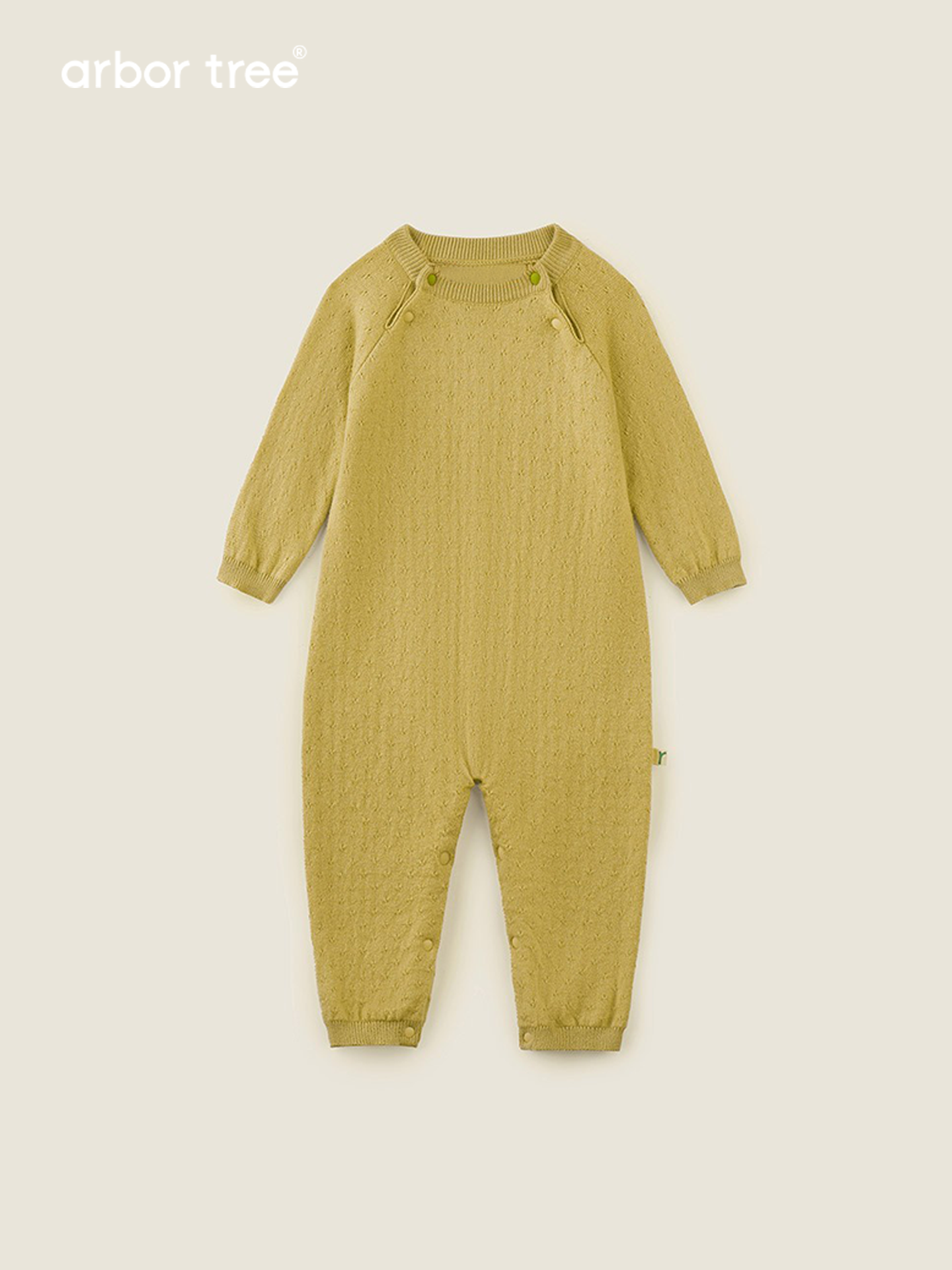 Organic cotton cashmere infant romper by arbortree, long-sleeve, shoulder-split, thick-knit baby and toddler romper in natural color.