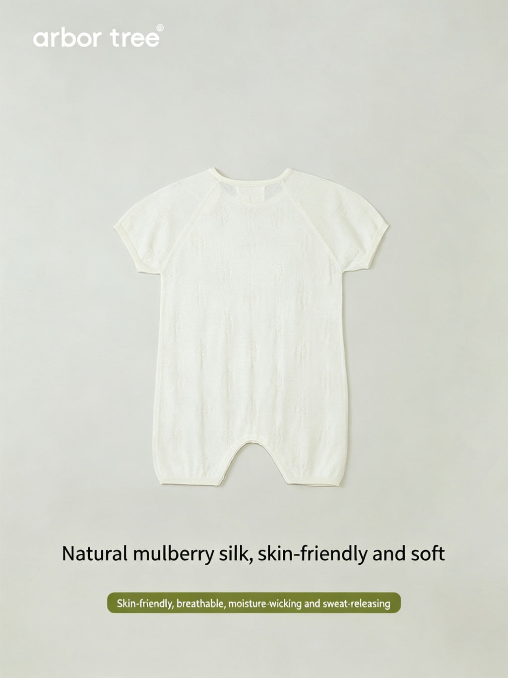 ArborTree men's and women's summer knit short-sleeve one-piece with button-down shoulders, made of silk and cashmere.