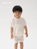 Organic cotton and linen summer kids T-shirt and shorts set by ArborTree, featuring lightweight, breathable fabric in natural colors.