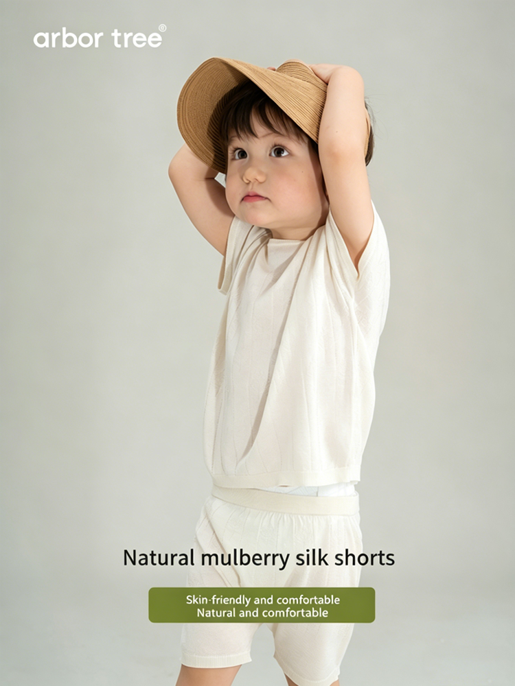 Baby and kids summer shorts by arbortree featuring silk and Bodhi leaf pattern, lightweight, cool, and non-sticky fabric.
