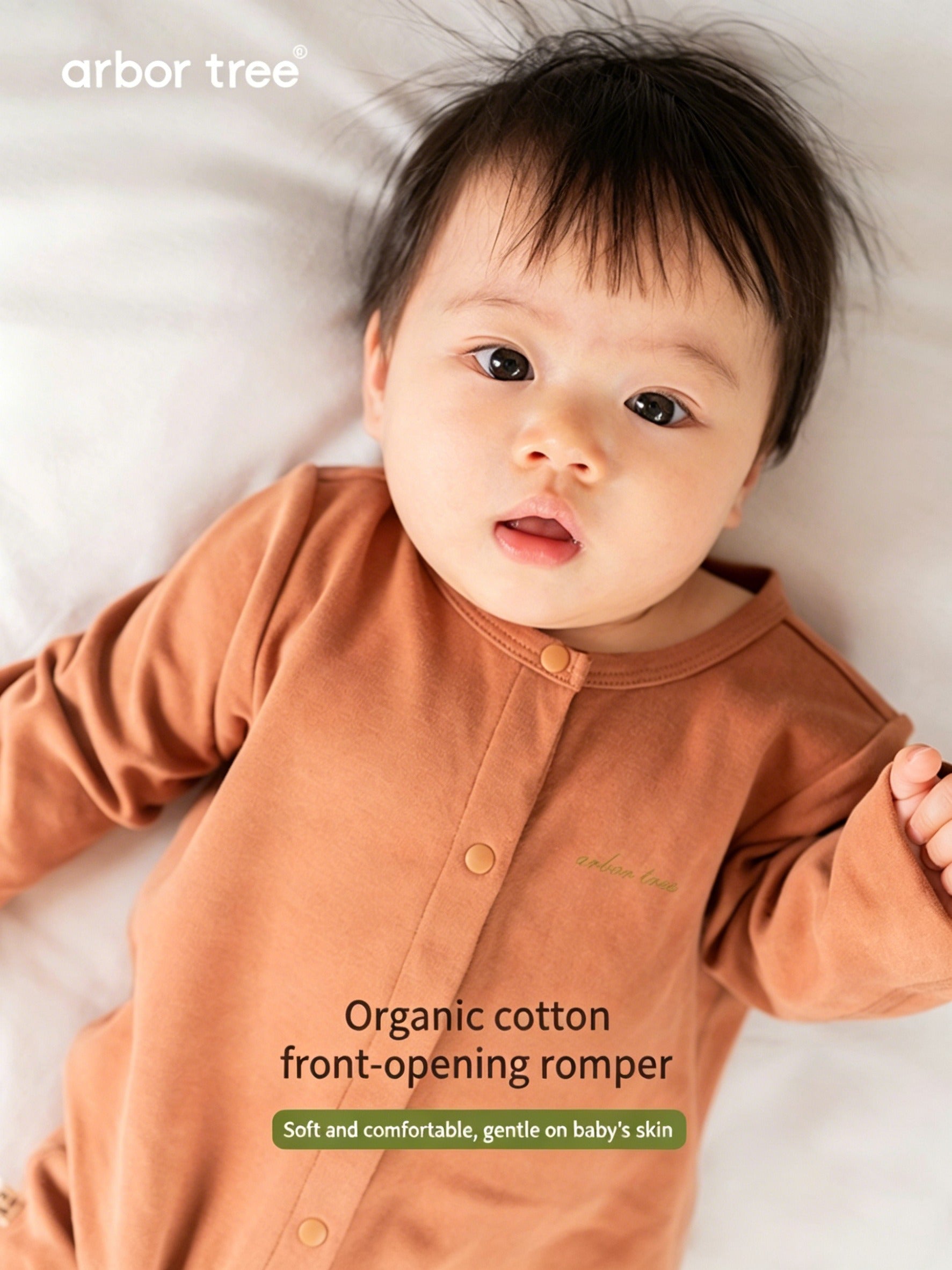 ArborTree organic cotton front-opening kids bodysuit in soft, natural fabric with snap closures and long sleeves.