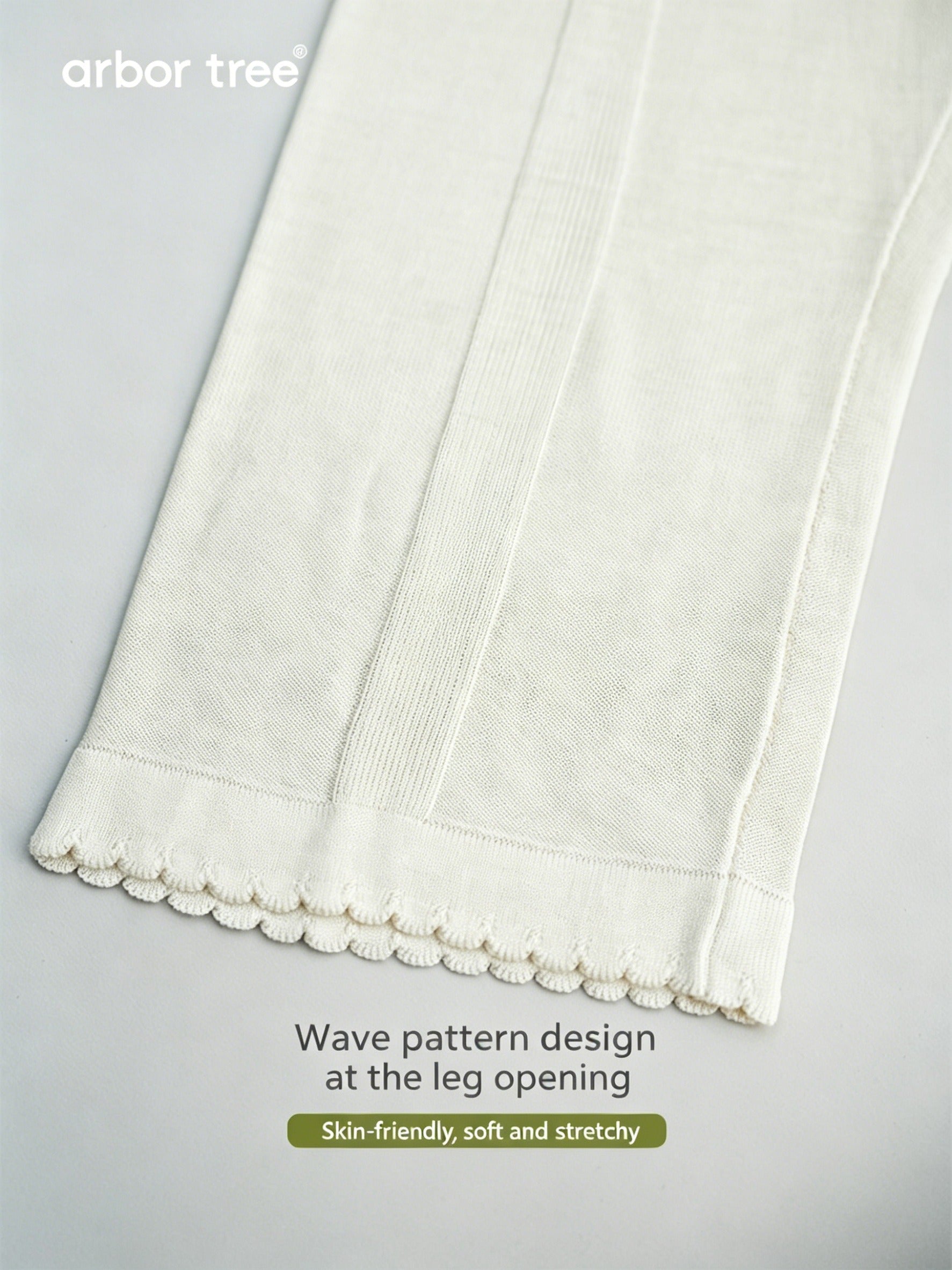 Soft ArborTree 100% Mulberry silk baby knitted trousers in pastel pink, featuring a cozy, stretchy knit for comfort.