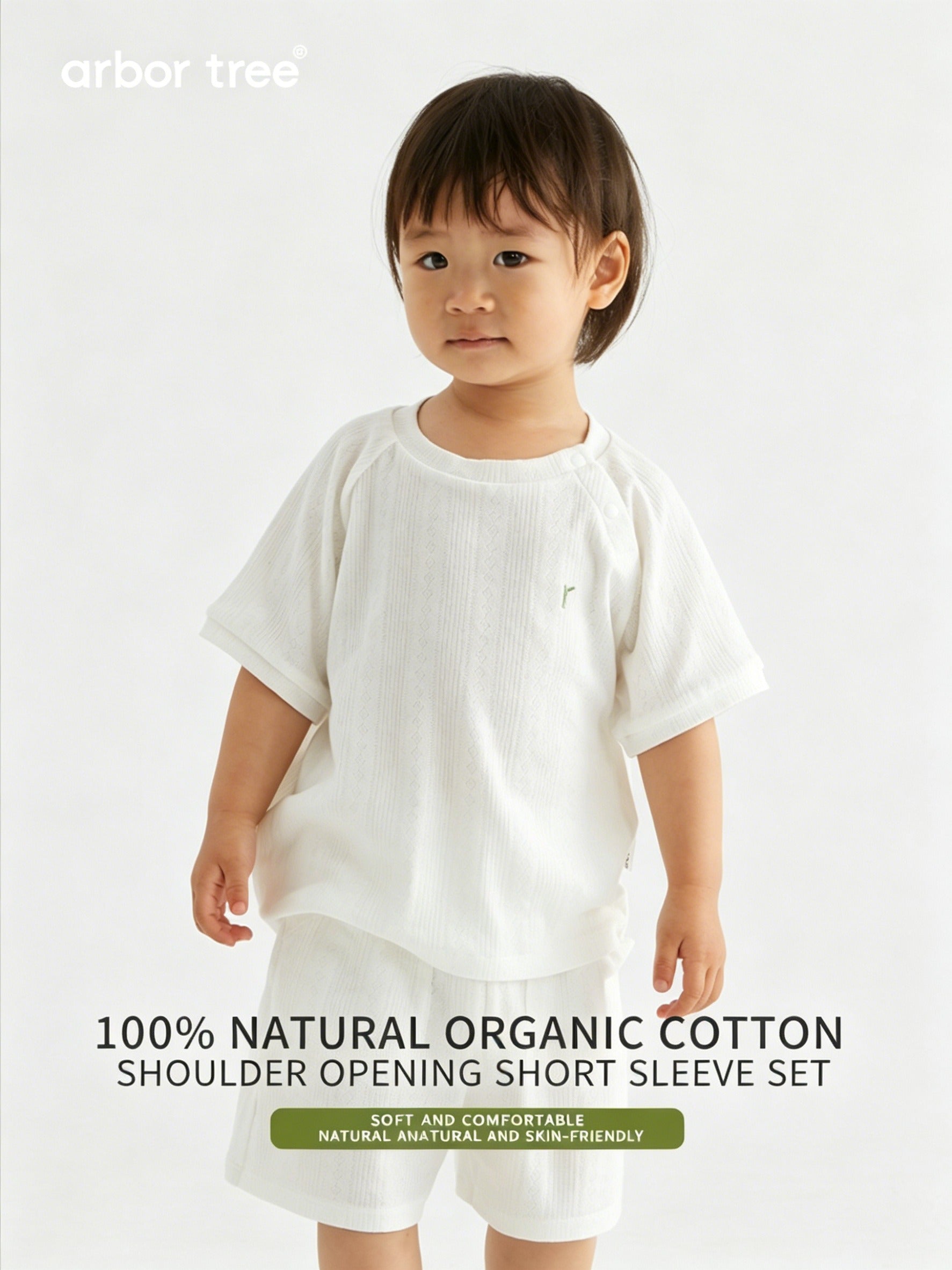 Organic cotton baby summer suit by ArborTree, featuring a lightweight, natural fabric and playful design for comfortable warm-weather wear.