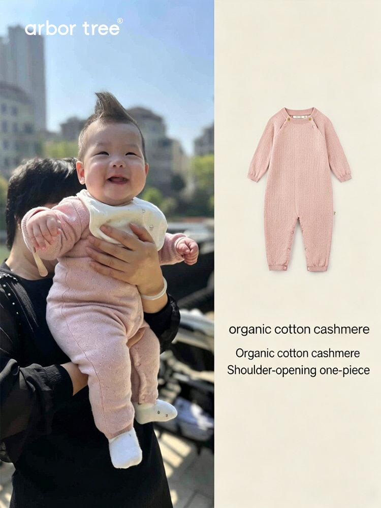 Organic cotton cashmere infant romper by arbortree, long-sleeve, shoulder-split, thick-knit toddler one-piece in soft natural fabric.