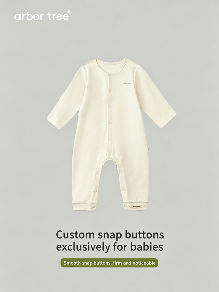 ArborTree organic cotton front-opening baby bodysuit, soft white fabric with snap closures and shoulder buttons for easy dressing.