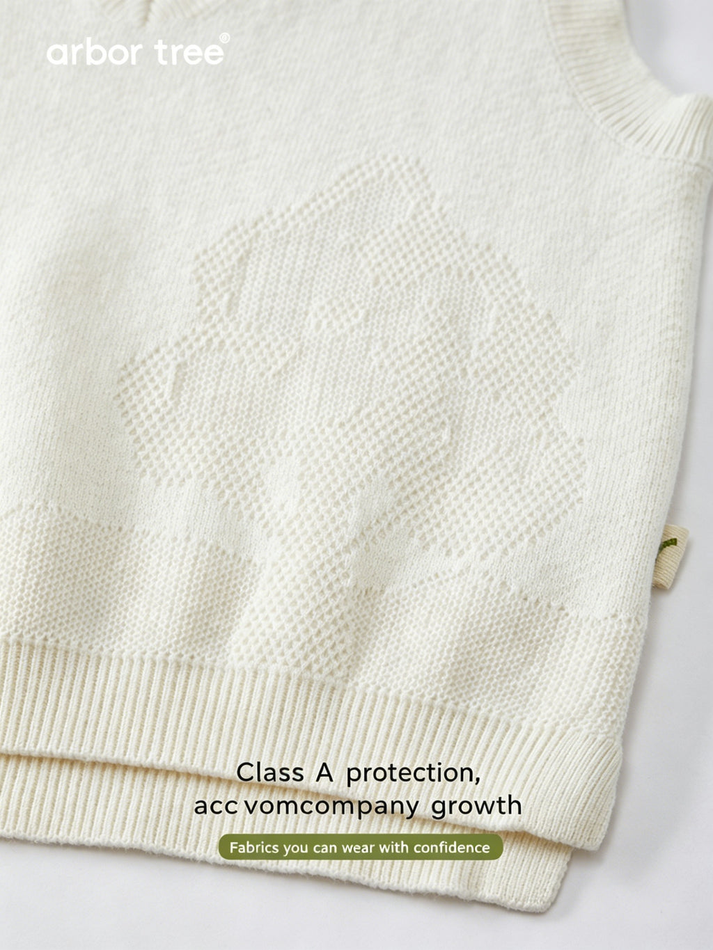ArborTree organic cotton and cashmere 3D pattern vest for kids, soft and cozy with textured design in natural tones.