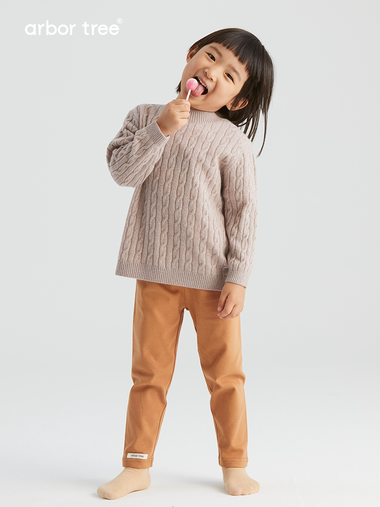 Organic cotton children's knit pants by arbortree, soft and snug in spring and fall style, shown in a cozy green color.