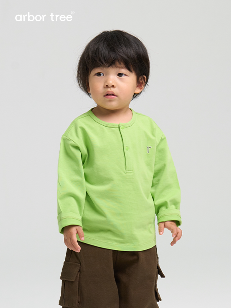 Organic cotton long sleeve baby and kids tee by arbortree, soft, breathable, and suitable for all seasons, shown in natural light.