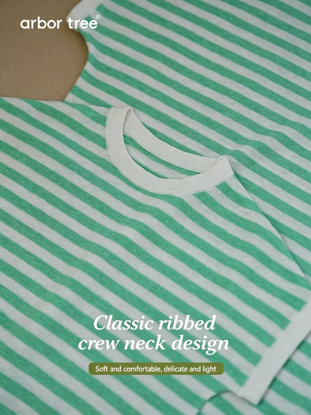 Child and parent wearing lightweight, striped knit tees made from 60% organic cotton and 40% linen by ArborTree.