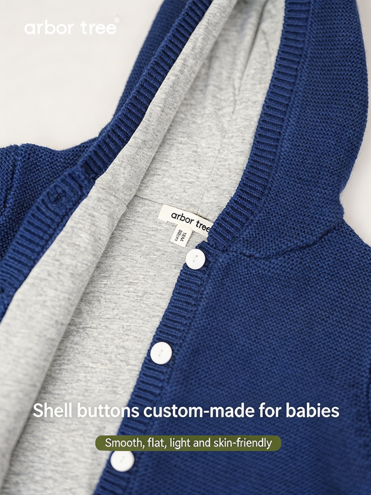 Organic cotton cashmere kids' hooded knit jacket by arbortree with cotton lining, suitable for spring, fall, and winter.
