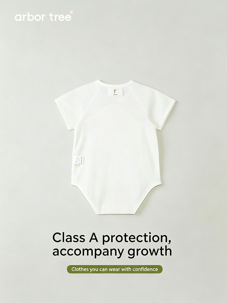 ArborTree organic cotton baby crawling suit with triangle pattern, designed for comfortable, natural movement for infants.
