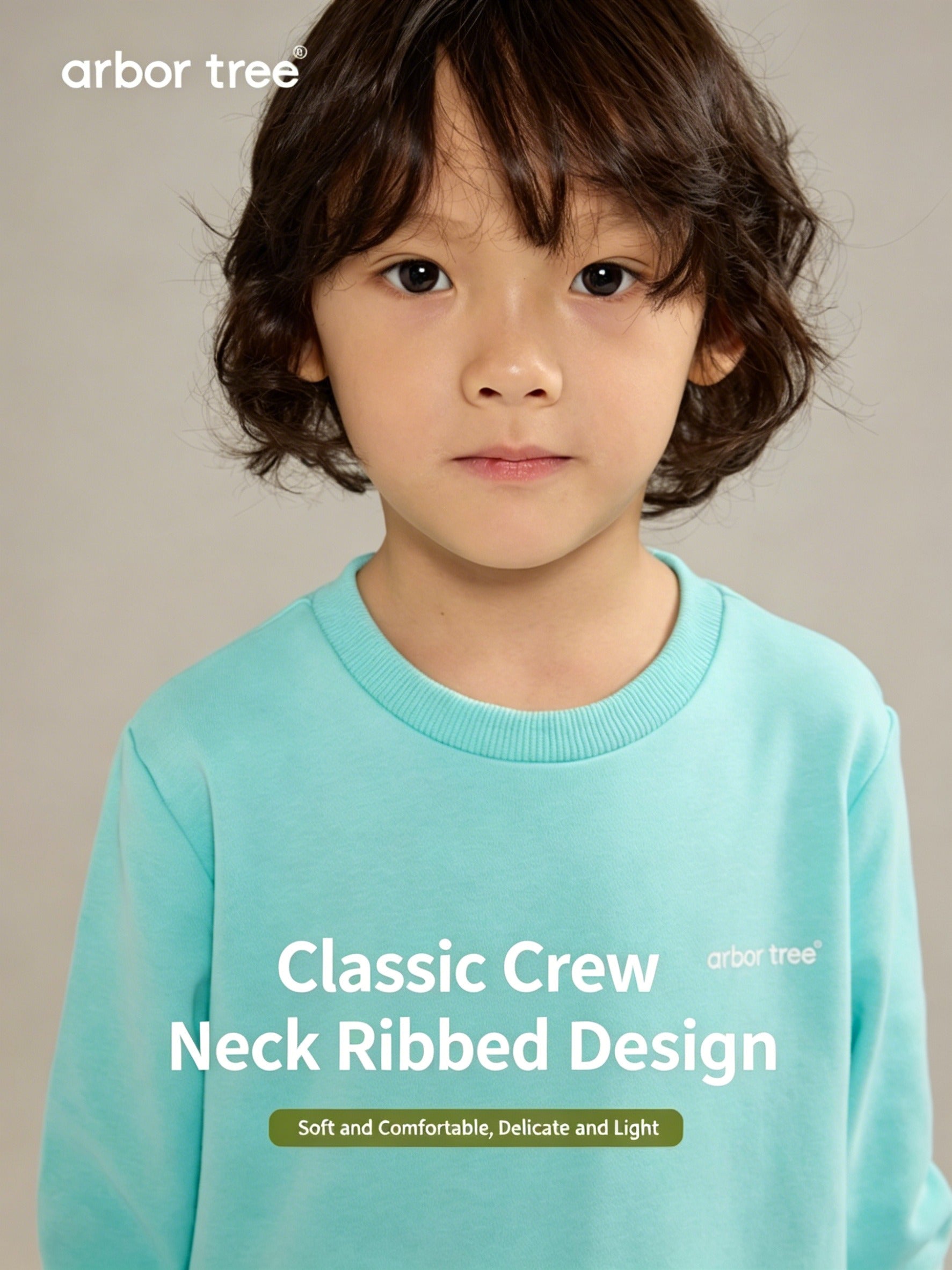 ArborTree organic cotton long-sleeve hoodie for kids, featuring pockets, warm and breathable for spring, fall, and winter wear.