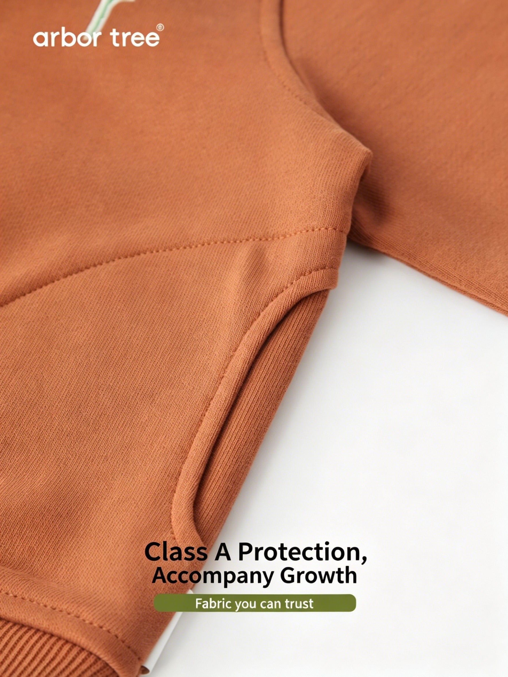 ArborTree organic cotton baby cardigan in light color, soft, moisture-wicking, perfect for spring and fall, meets Class A standards.