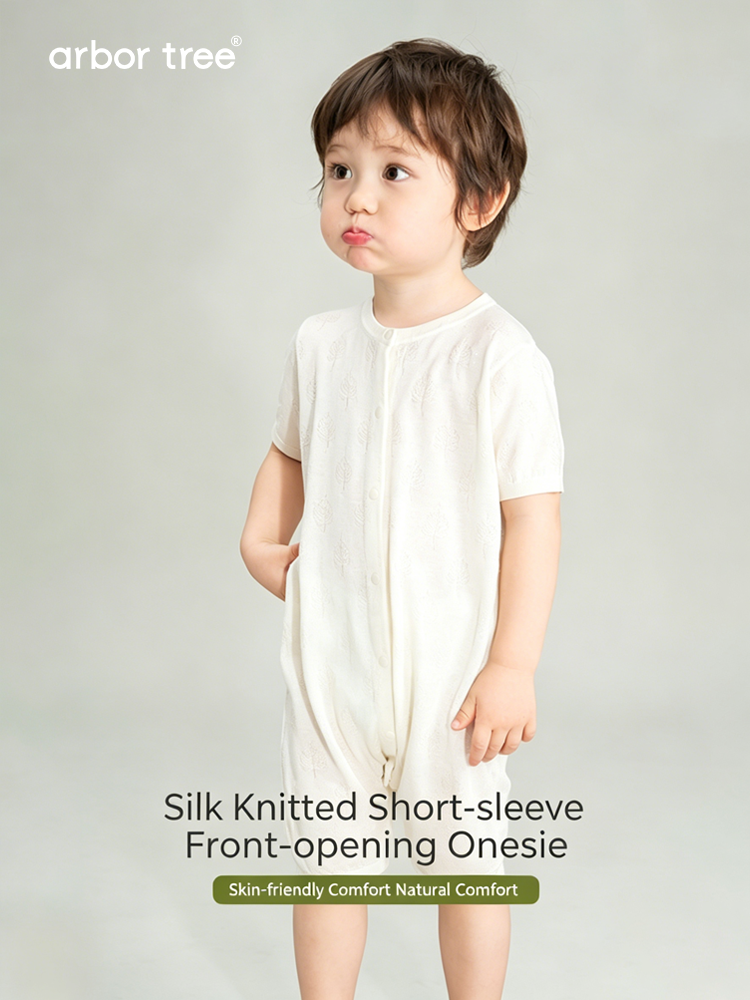 Soft silk and cashmere summer baby romper by arbortree, front-opening design with gentle pastel colors and cozy fabric.