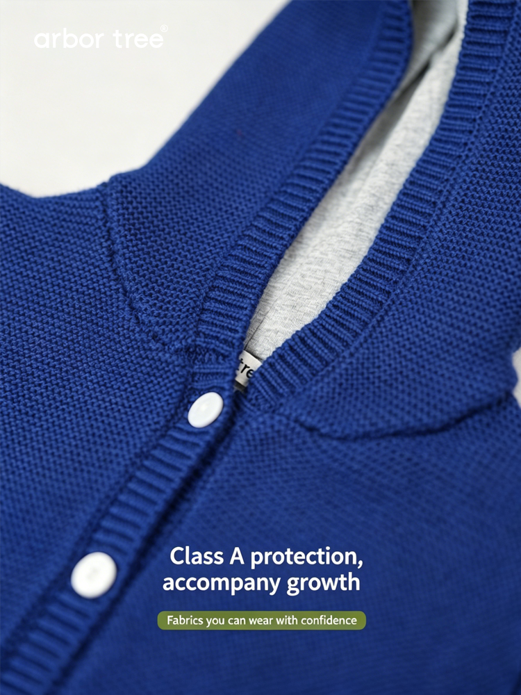 Organic cotton cashmere kids' hooded knit jacket by arbortree with cotton lining, suitable for spring, fall, and winter.