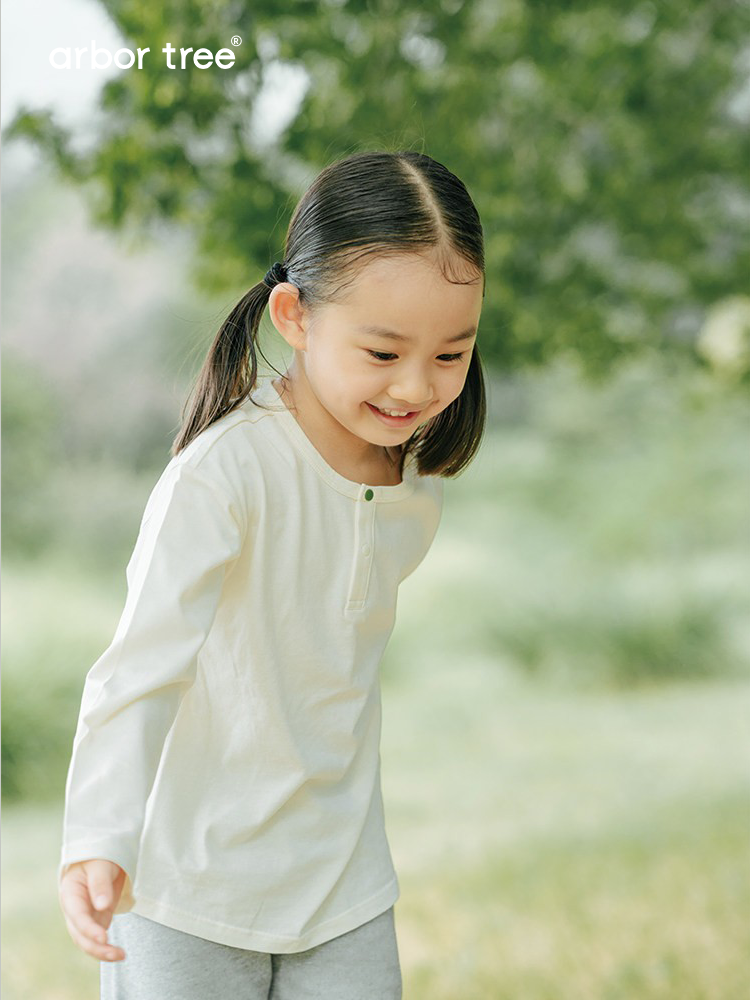 Organic cotton long sleeve baby and kids tee by arbortree, soft, breathable, all-season shirt shown in natural fabric and comfortable fit.
