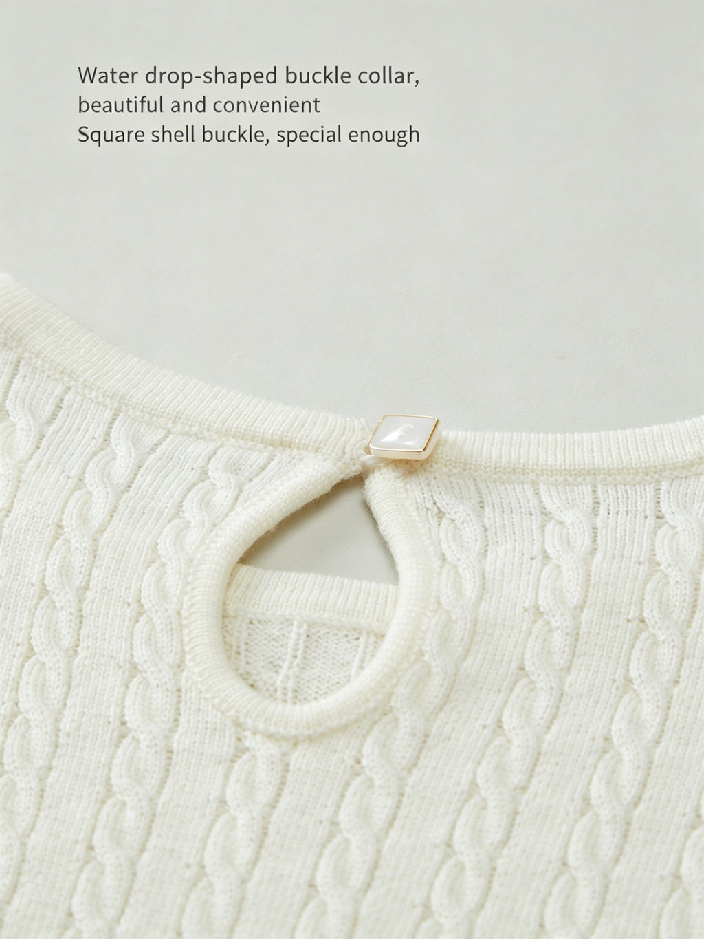 ArborTree 100% Merino superfine wool baby dress in soft, natural fabric, featuring a gentle pastel color and cozy design.