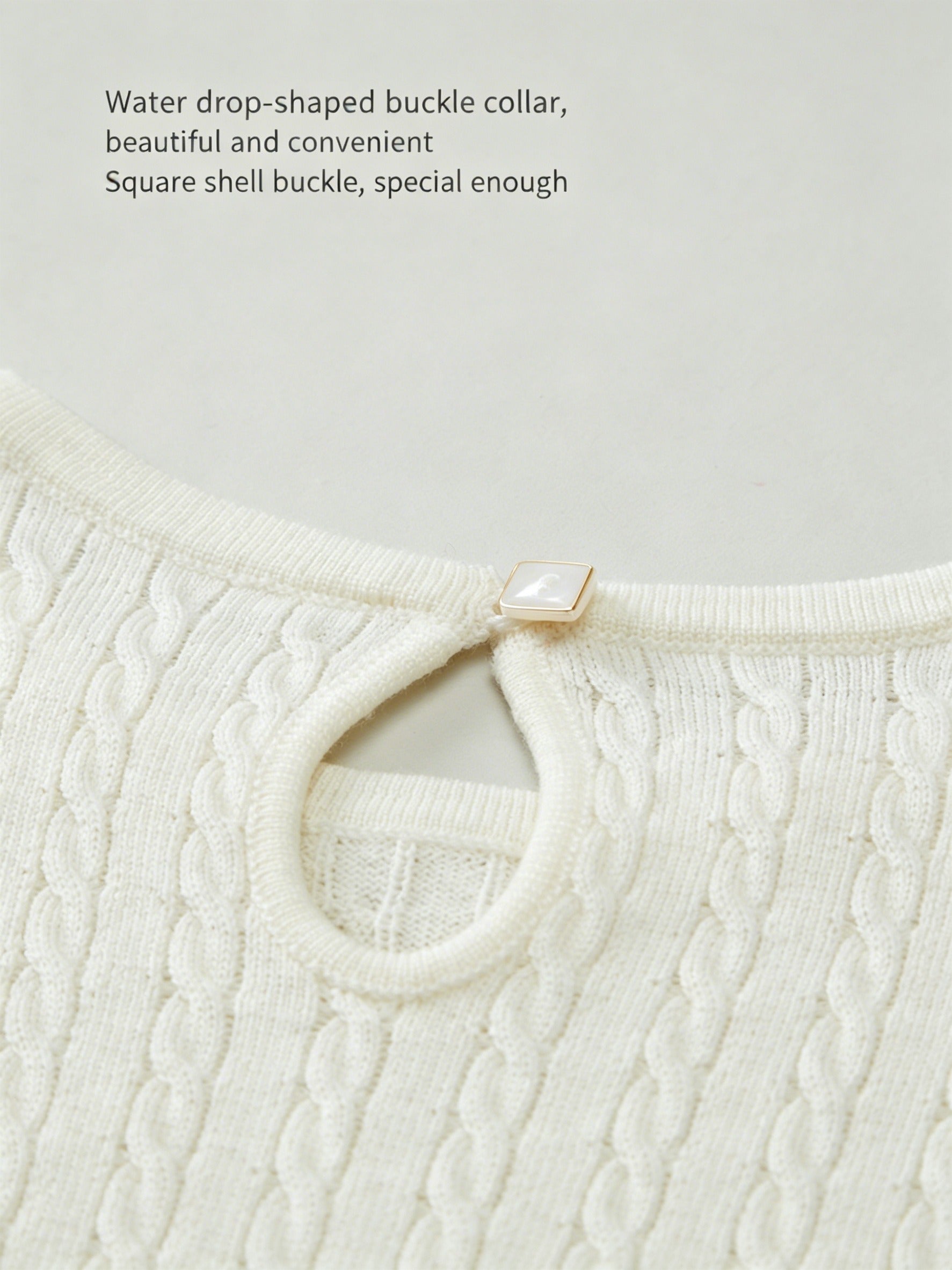 ArborTree 100% Merino superfine wool baby dress in soft, natural fabric, featuring a gentle pastel color and cozy design.