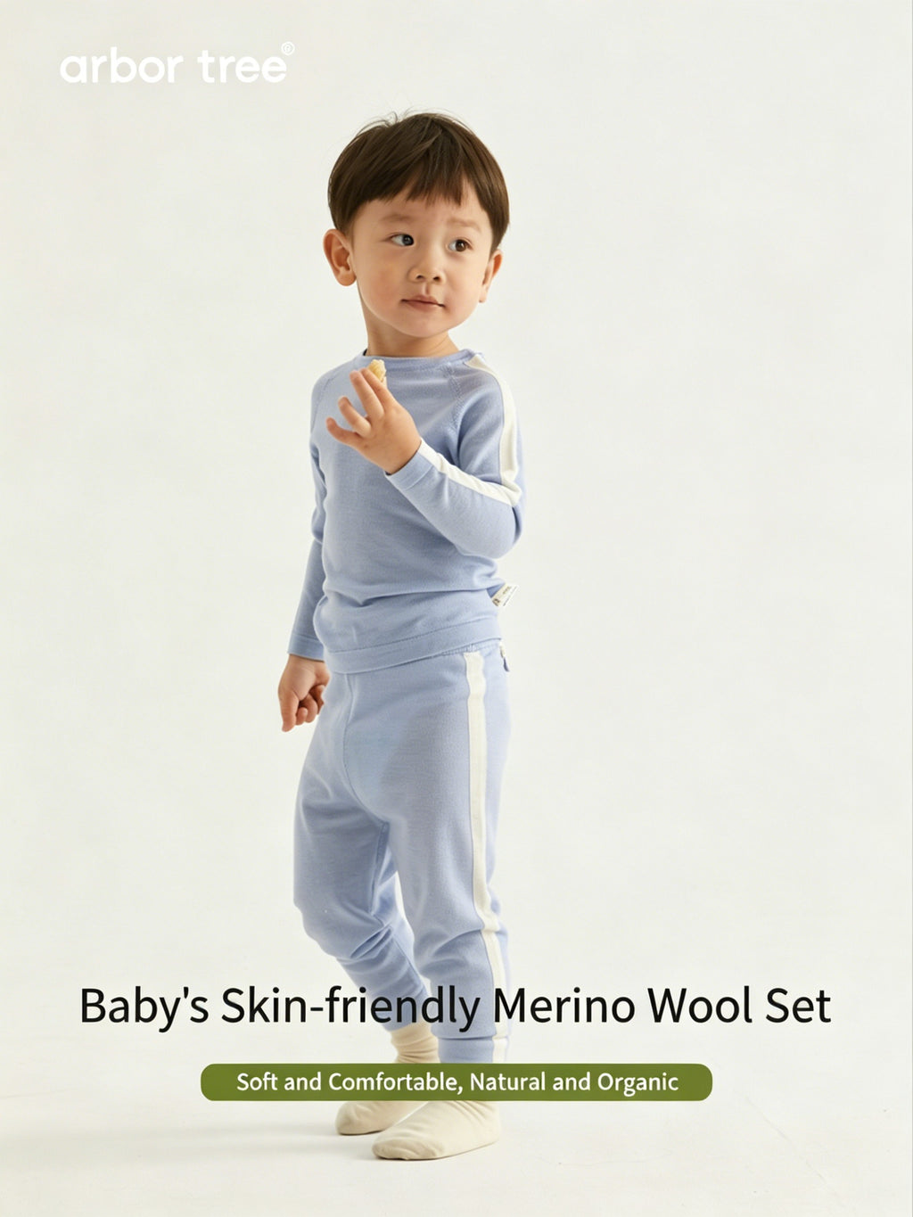 ArborTree 100% merino mercerised wool baby set featuring soft, natural wool clothing for infants, in gentle pastel colors.