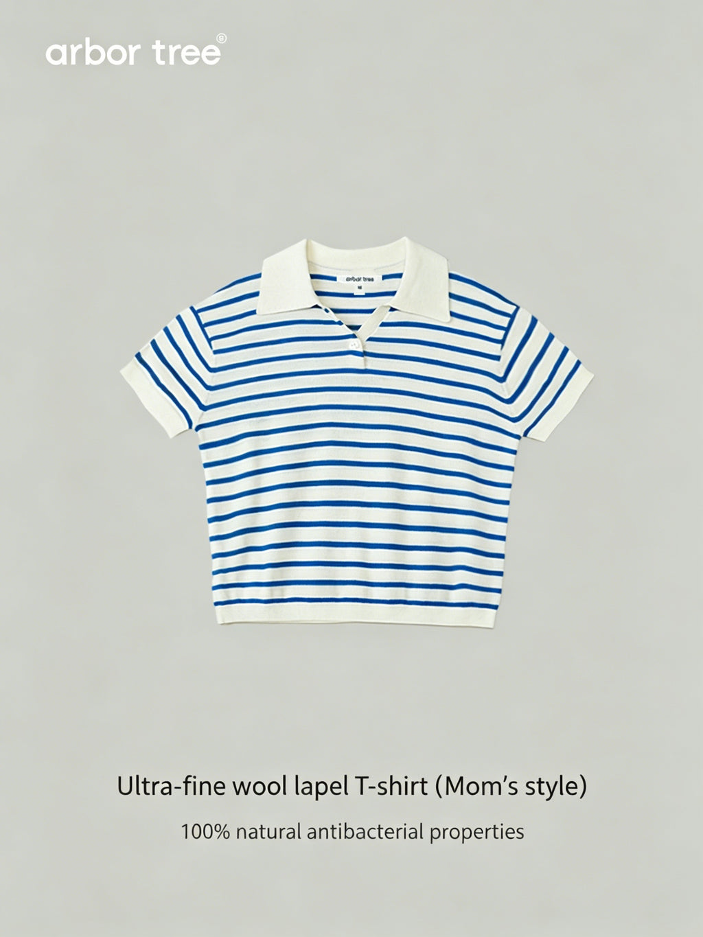 ArborTree baby short-sleeved wool T-shirt with lapel collar, made from 100% superfine wool, in a soft, natural color.