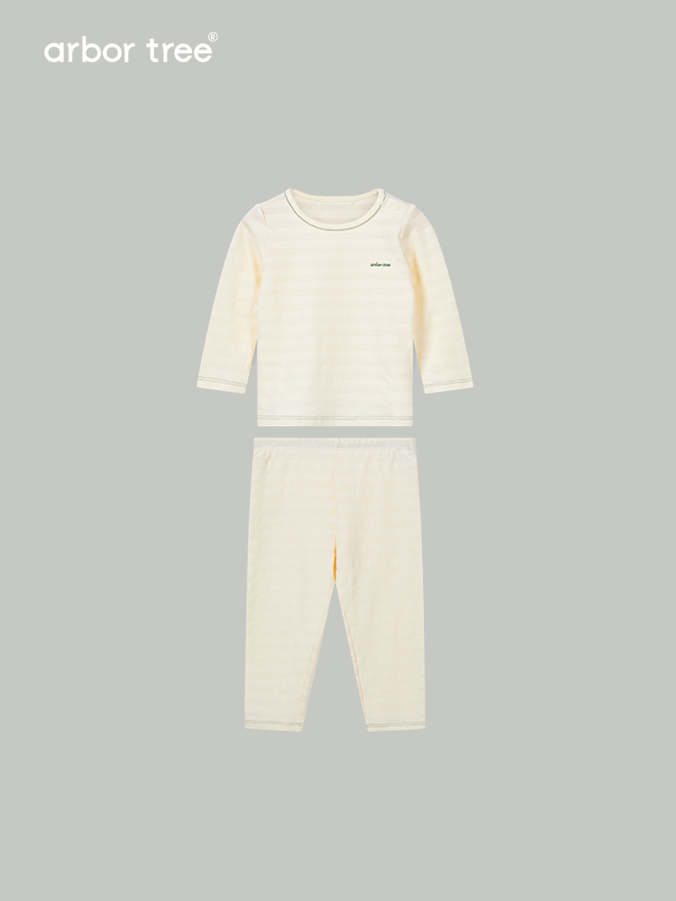 ArborTree organic cotton baby pajamas set with long sleeves, suitable for spring, fall, and winter, in soft natural colors.