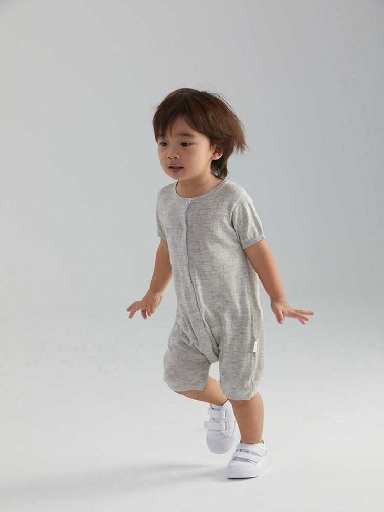 Soft silk and cashmere summer baby romper by arbortree with front-opening design, shown in a gentle pastel color.