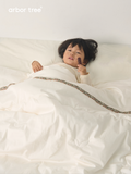 ArborTree organic cotton satin and silk baby quilt with natural, skin-friendly materials, soft and warm for children.