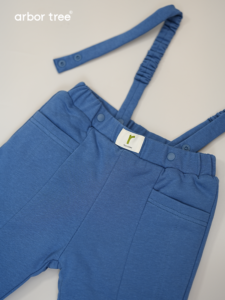 ArborTree organic cotton winter overalls for boys and girls, showing the warm, natural fiber fabric and adjustable straps.