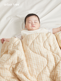 Soft organic cotton baby quilt by ArborTree, breathable, moisture-wicking, and machine washable for cozy comfort.