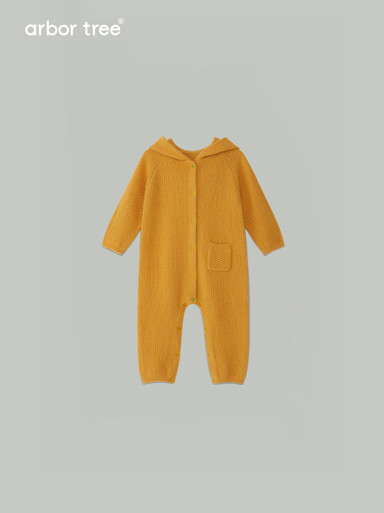 ArborTree 100% cashmere hooded onesie for kids, soft cream-colored fabric with a hood and cozy design, natural sourced brand.