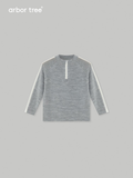 Baby's ArborTree merino wool half-zip pullover in natural mercerized wool, showcasing soft texture and cozy fit.