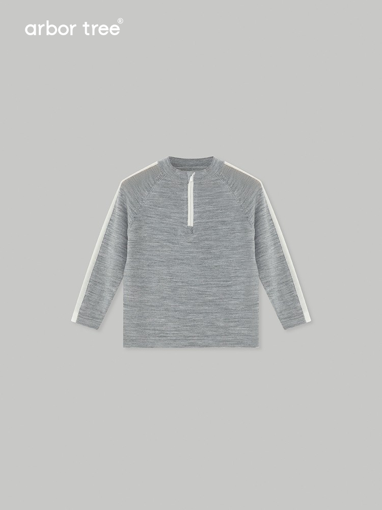 Baby's ArborTree merino wool half-zip pullover in natural mercerized wool, showcasing soft texture and cozy fit.