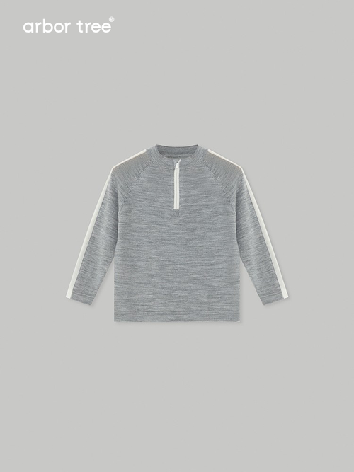 Baby's ArborTree merino wool half-zip pullover in natural mercerized wool, showcasing soft texture and cozy fit.