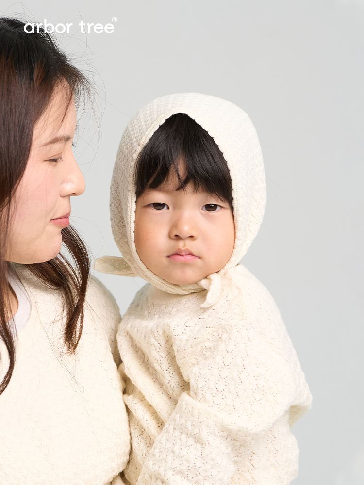 ArborTree 100% Merino Wool triangular headband with whisper pattern for baby boys and girls, soft and warm accessory.