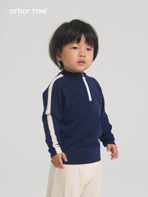 ArborTree baby half zip pullover top made from 100% merino mercerised wool, featuring a soft, cozy design for infants.