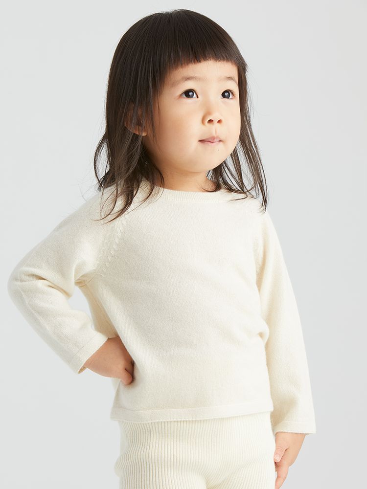 Baby cashmere raglan top by ArborTree, soft and cozy, featuring a classic raglan sleeve design in natural shades.