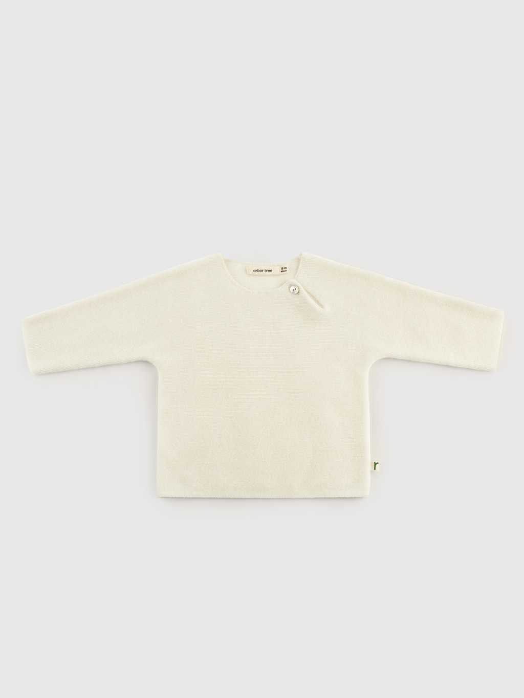 ArborTree baby and toddler cashmere drop-shoulder sweater in soft cream, suitable for boys and girls in spring, fall, and winter.