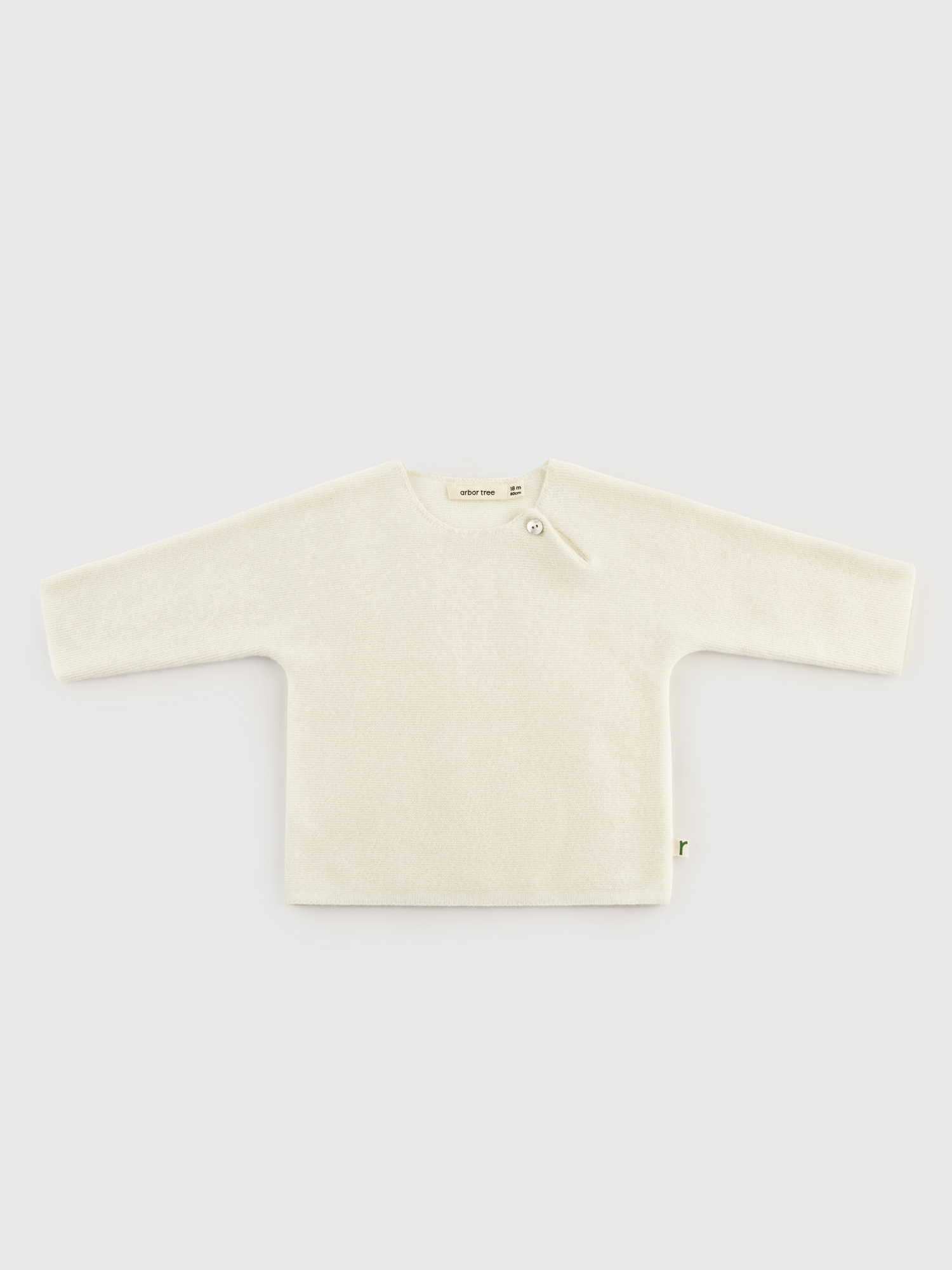 ArborTree baby and toddler cashmere drop-shoulder sweater in soft cream, suitable for boys and girls in spring, fall, and winter.