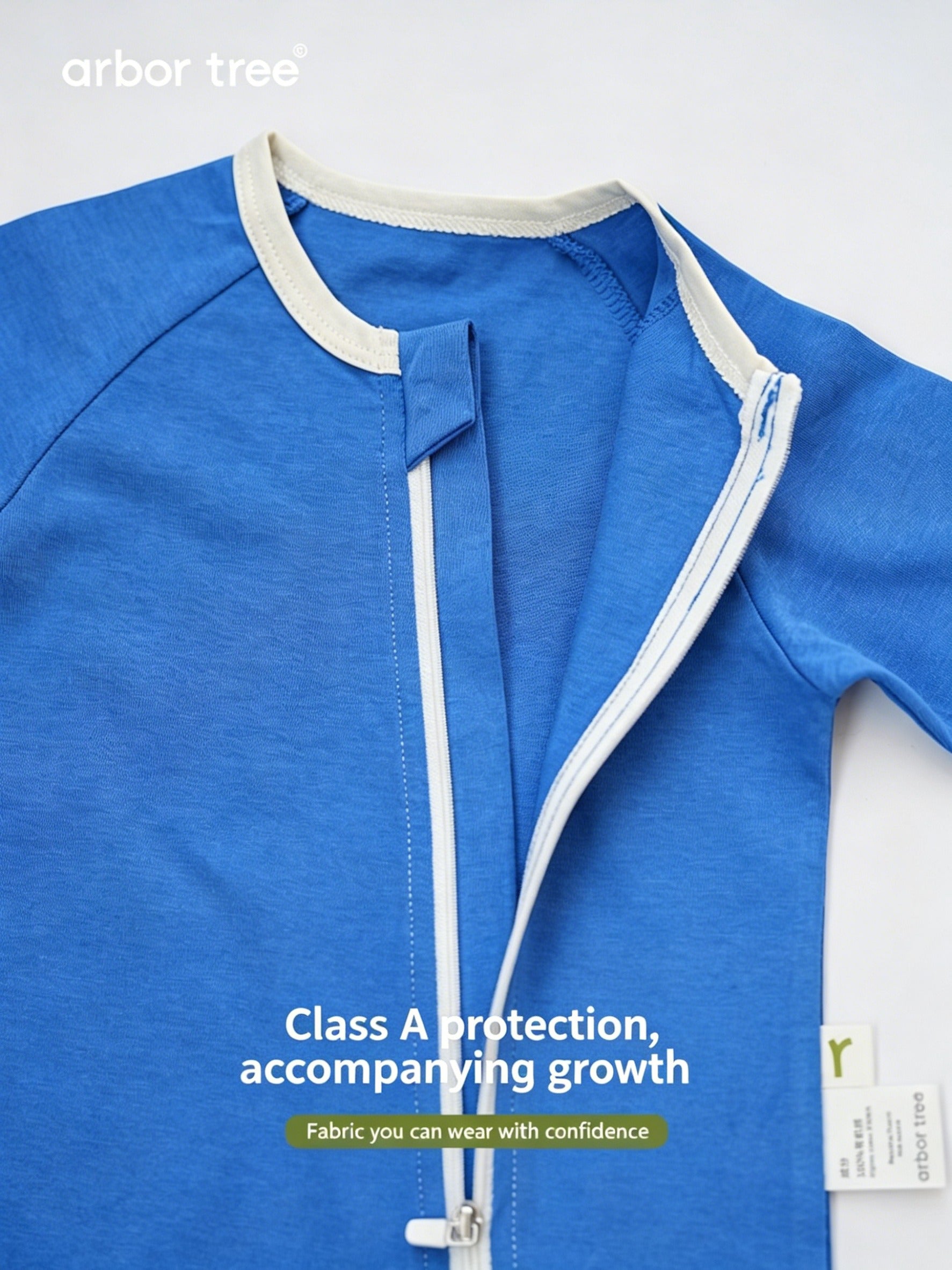 ArborTree organic cotton long-sleeve one-piece for kids with side zipper, suitable for boys and girls in spring and fall.