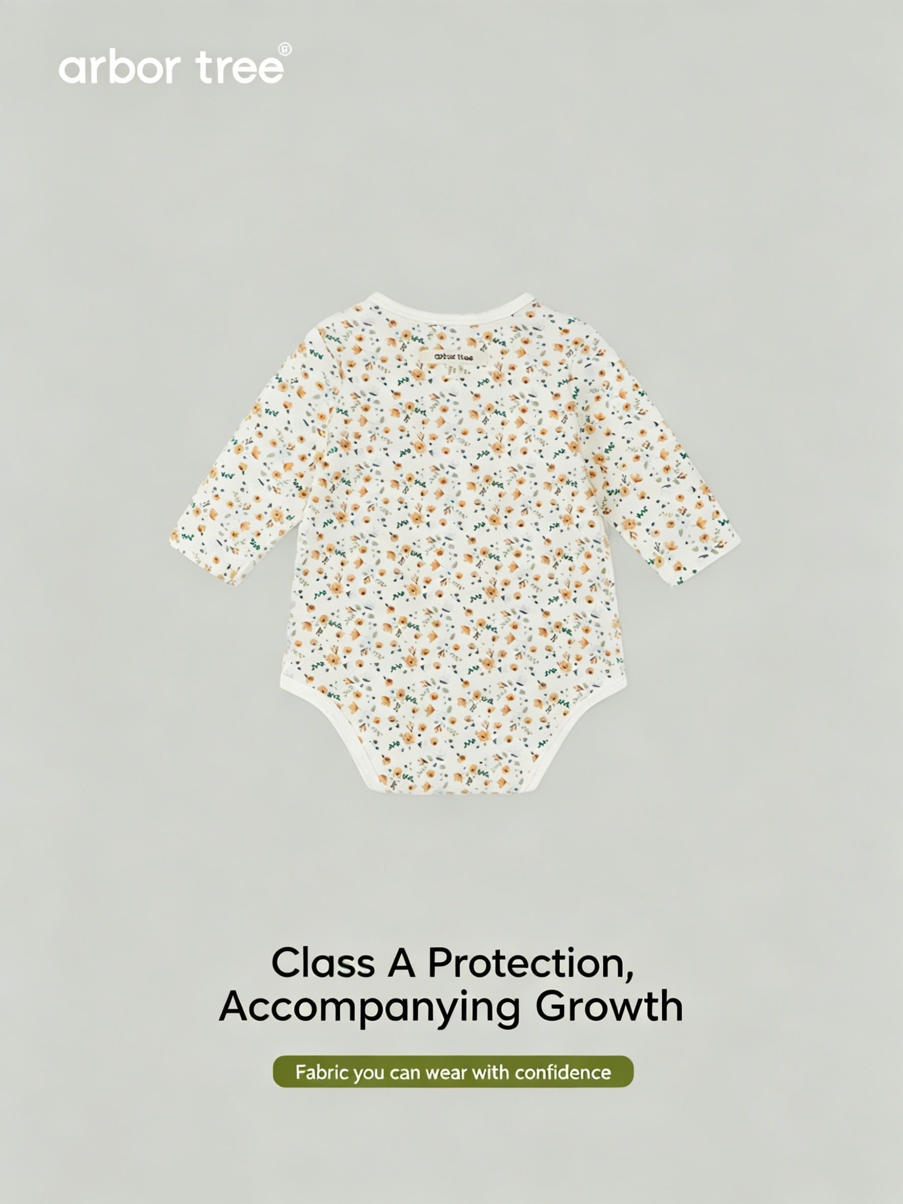 ArborTree organic cotton baby romper with small floral print, long-sleeve, soft and gentle on skin, ideal for infants.