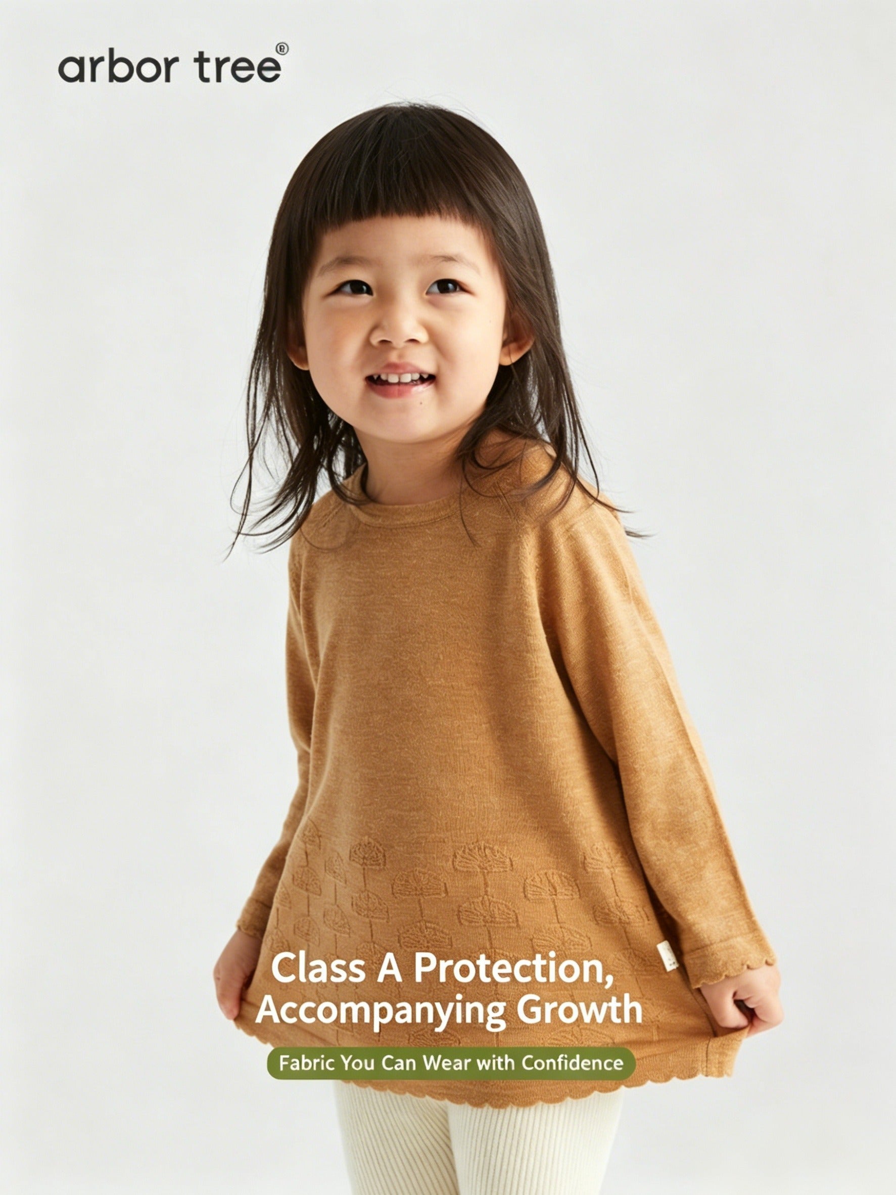 Unisex kids' ArborTree Ginkgo leaf long-sleeve knit T-shirt in wool-linen, featuring a natural leaf print for spring and fall wear.