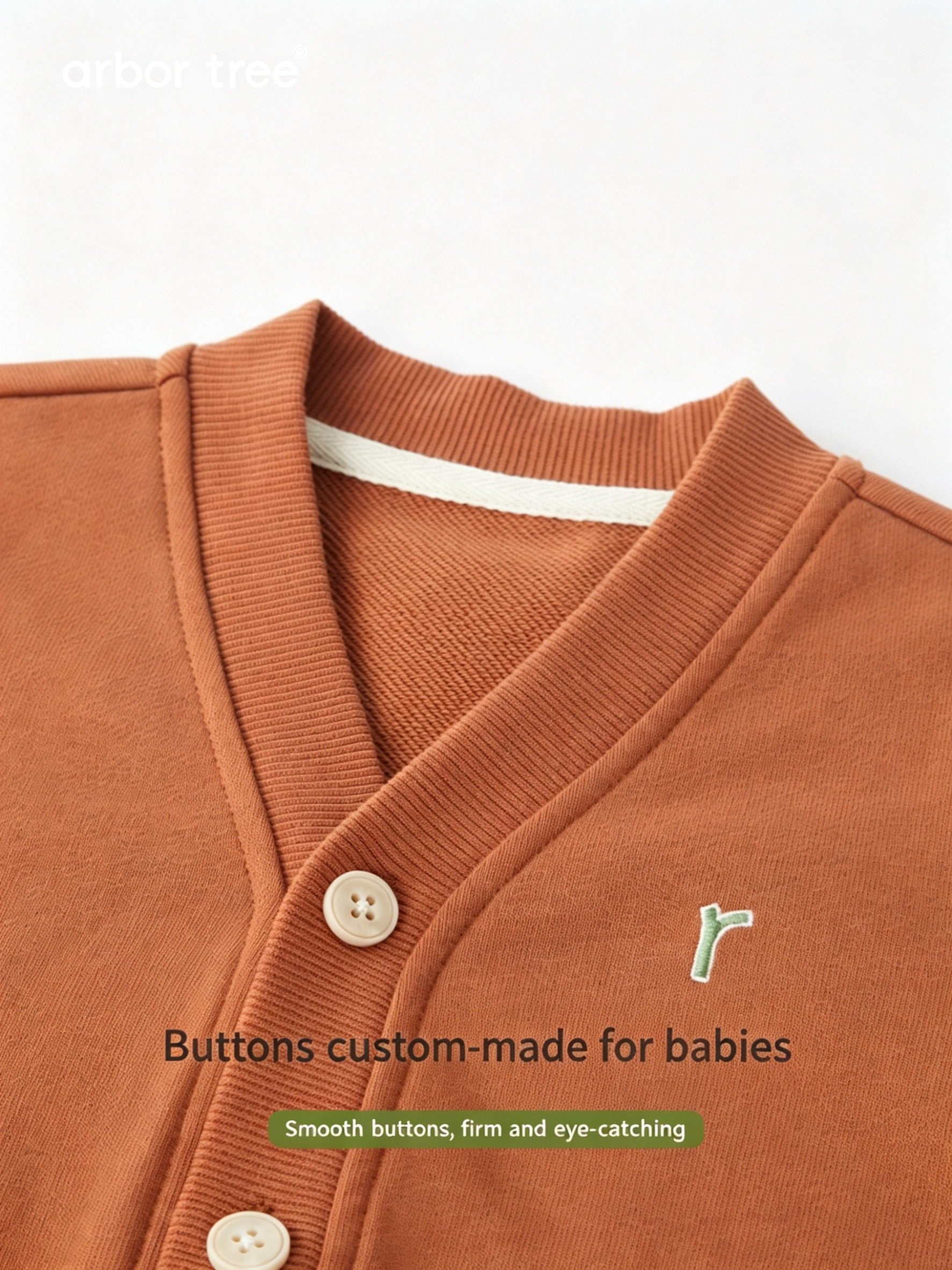 ArborTree organic cotton baby cardigan for spring and fall, featuring a soft, moisture-wicking fabric and natural baby clothing style.