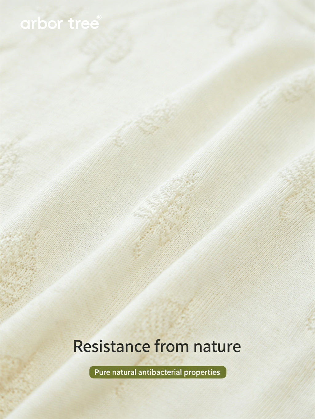 ArborTree men's and women's summer knit short-sleeve one-piece made of mulberry silk and cashmere, featuring button-down shoulders.