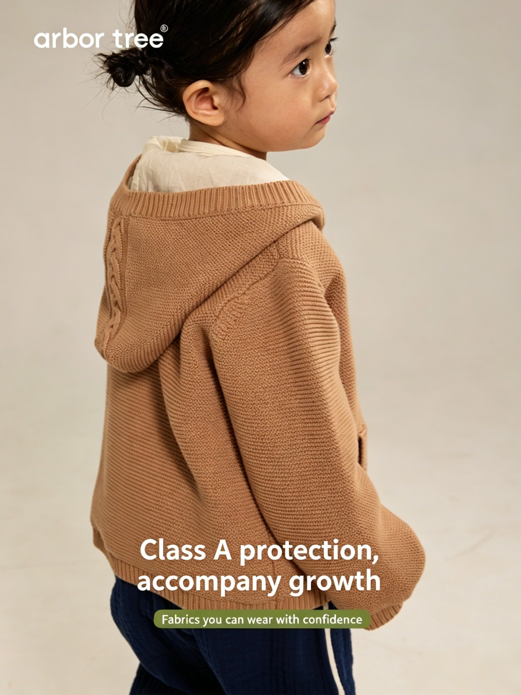 Unisex kids' ArborTree organic cotton knit hooded jacket with warm lining, suitable for spring, fall, and winter seasons.