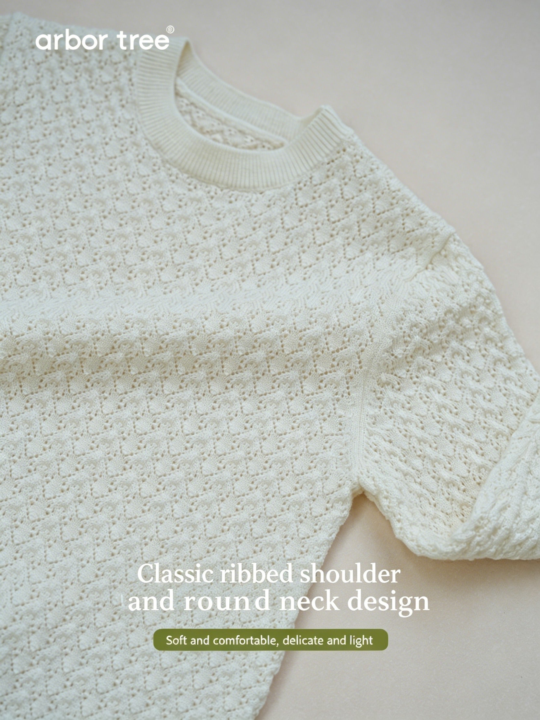 ArborTree 100% Merino Wool baby romper with whisper pattern, shoulder-split design, ideal for spring and fall, in soft knit fabric.